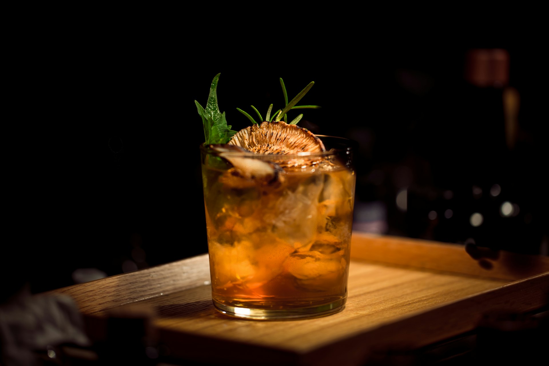 Cocktail glasses raised in a welcome toast